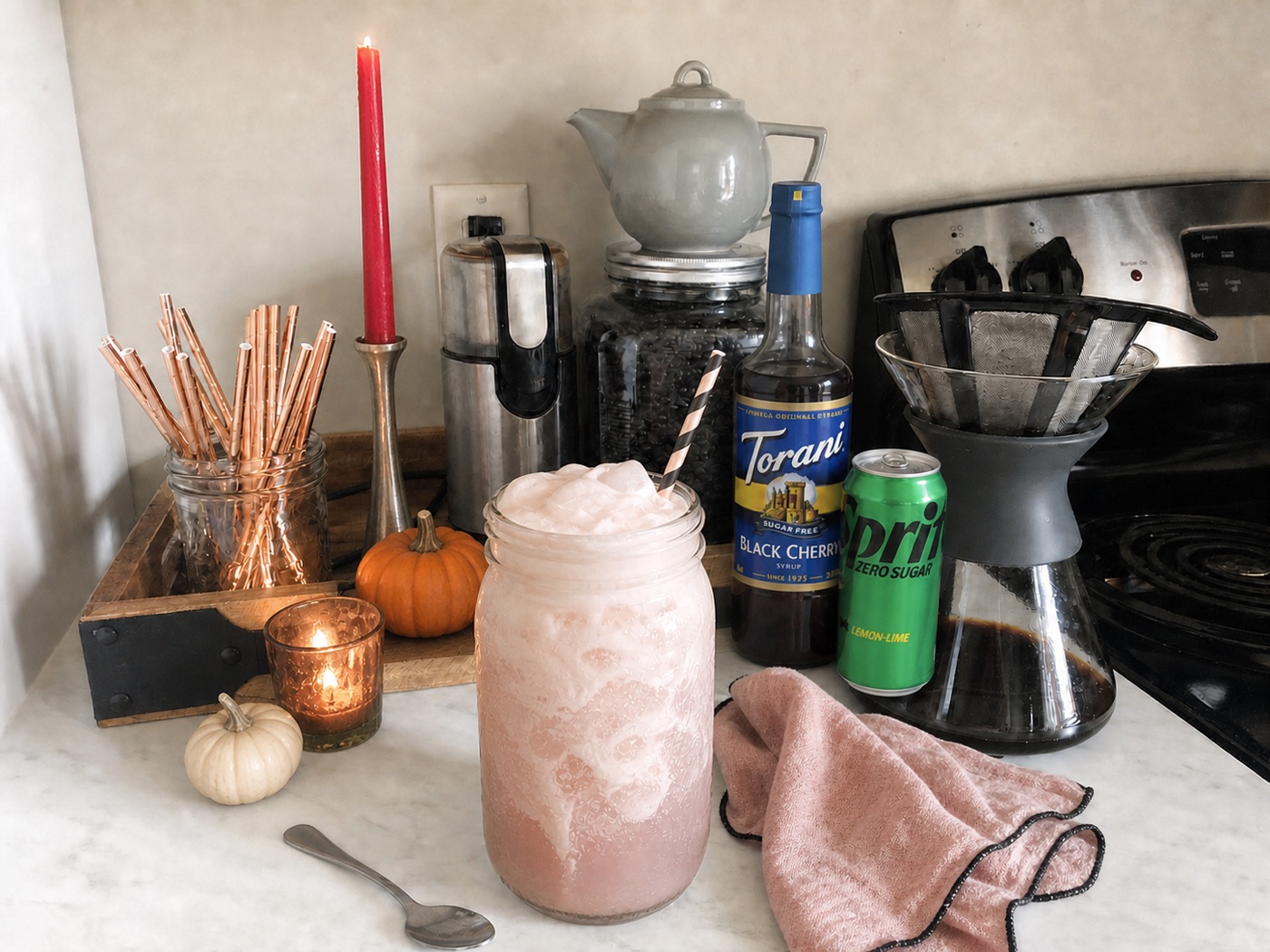 Ghostly Cherry Cream with pale pink lemon-lime soda and smooth cream clouds, Torani Sugar Free Black Cherry, and Sprite Zero Sugar.