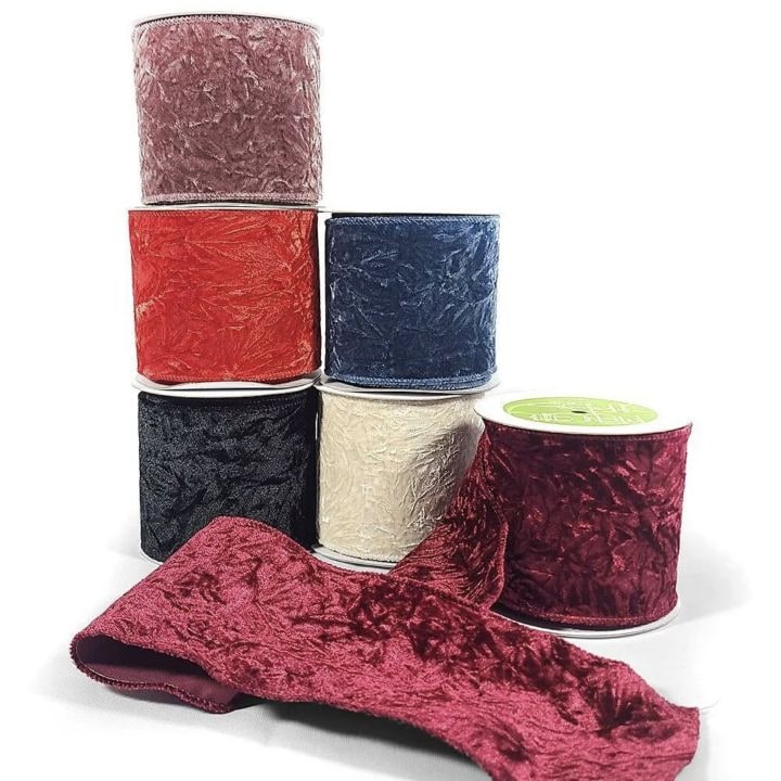 Spools of crushed velvet ribbon, including black.